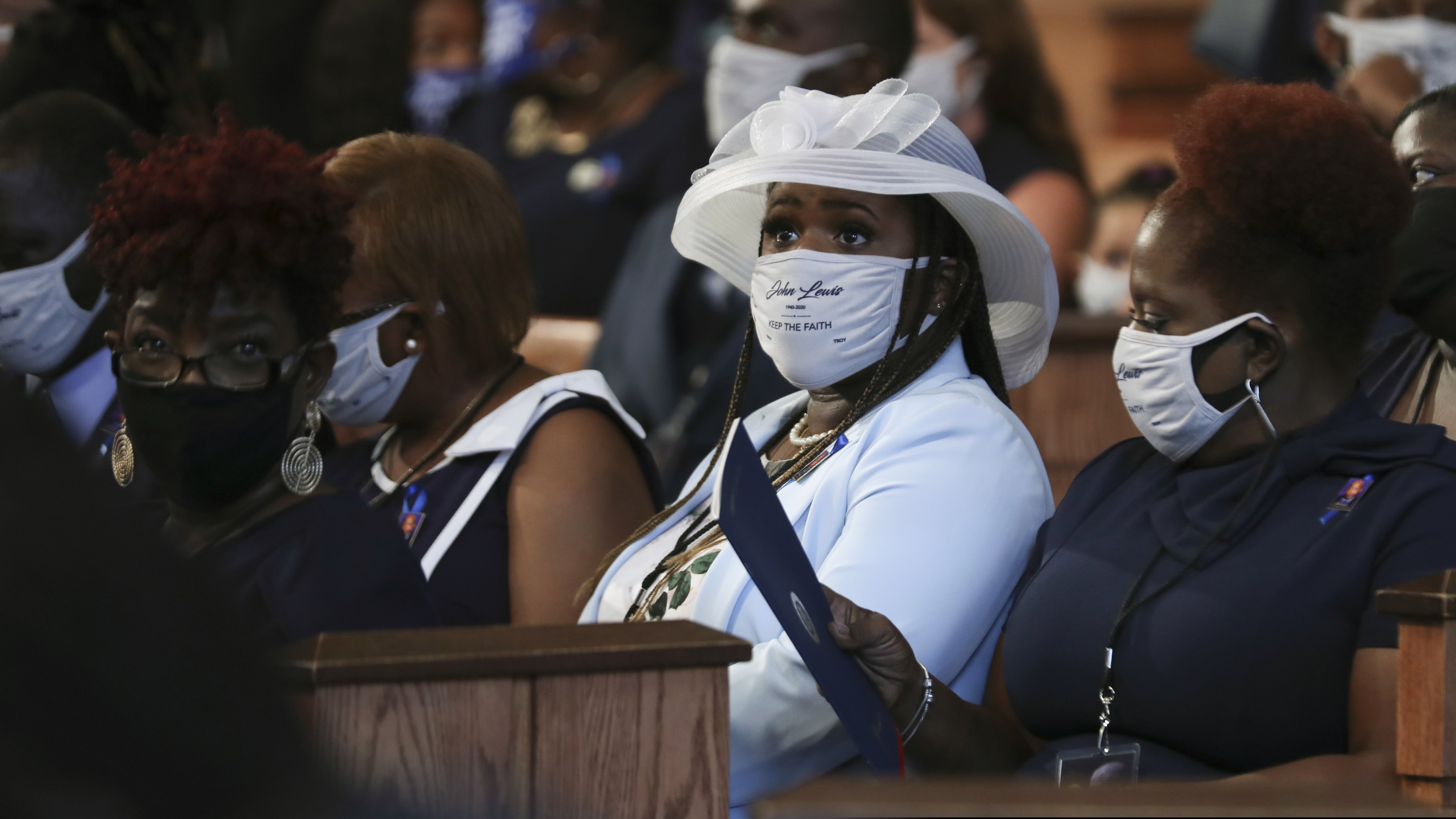 Family members attend the funeral service for the late Rep. John Lewis, D-Ga., at Ebenezer Baptist Church in Atlanta, Thursday, July 30, 2020.    (Alyssa Pointer/Atlanta Journal-Constitution via AP, Pool)