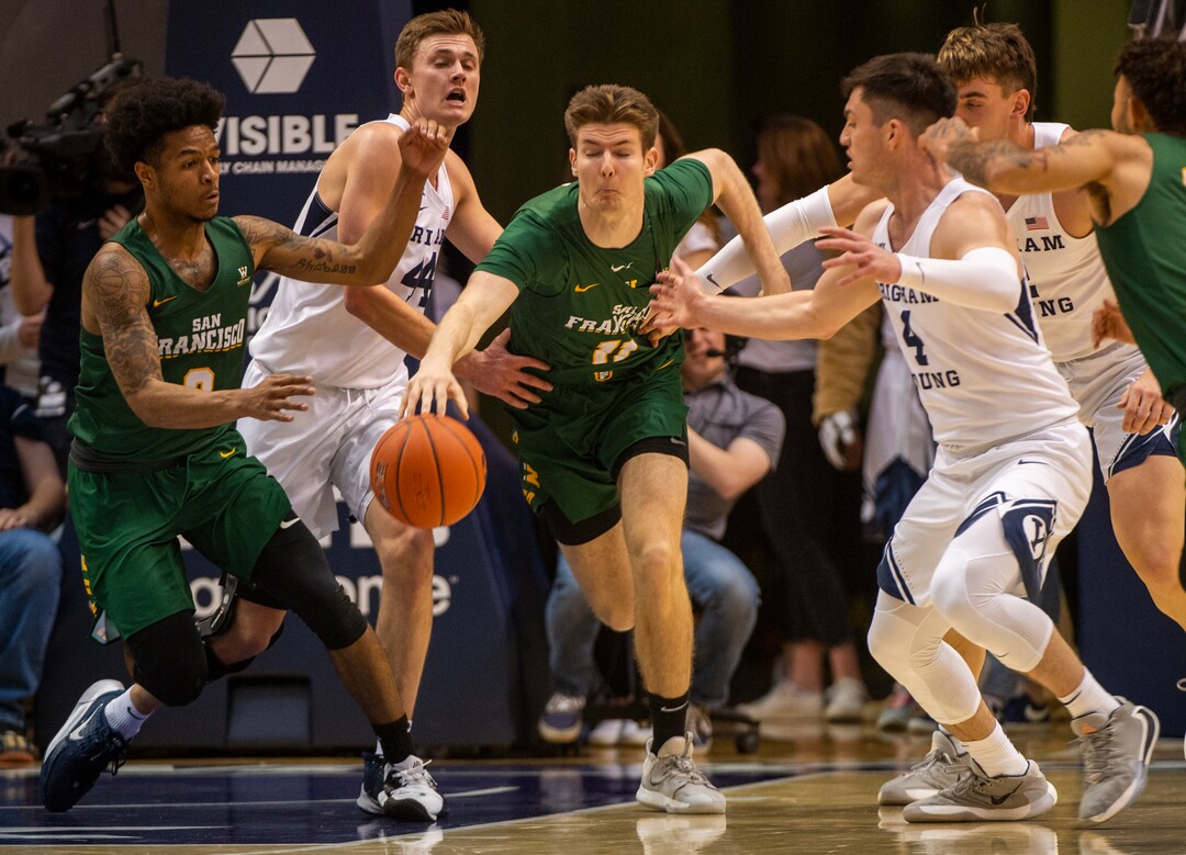 (Rick Egan  |  The Salt Lake Tribune)    San Francisco Dons guard Khalil Shabazz (0) and San Francisco Dons forward Remu Raitanen (11) go for a loose ball along with Brigham Young Cougars guard Alex Barcello (4), in WCC basketball acton between the Brigham Young Cougars and the San Francisco Dons, at the Marriott Center, Saturday, Feb. 8, 2020.