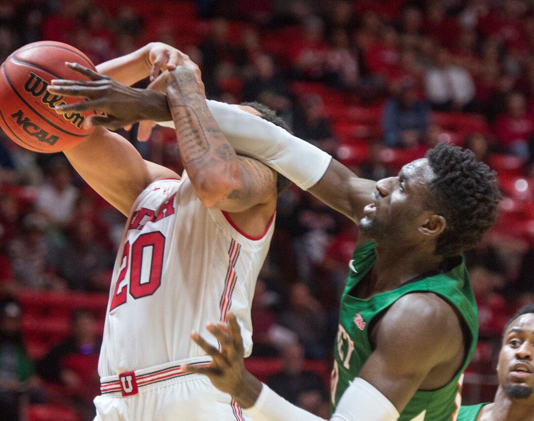 (Rick Egan  |  The Salt Lake Tribune)    Mississippi Valley State Delta Devils center Emmanuel Ejeh (10) prevents Utah Utes forward Timmy Allen (20) from scoring, in basketball action between Utah Utes and Mississippi Valley State Delta Devils at the Jon M. Huntsman Center, Thursday, Nov. 15, 2018.