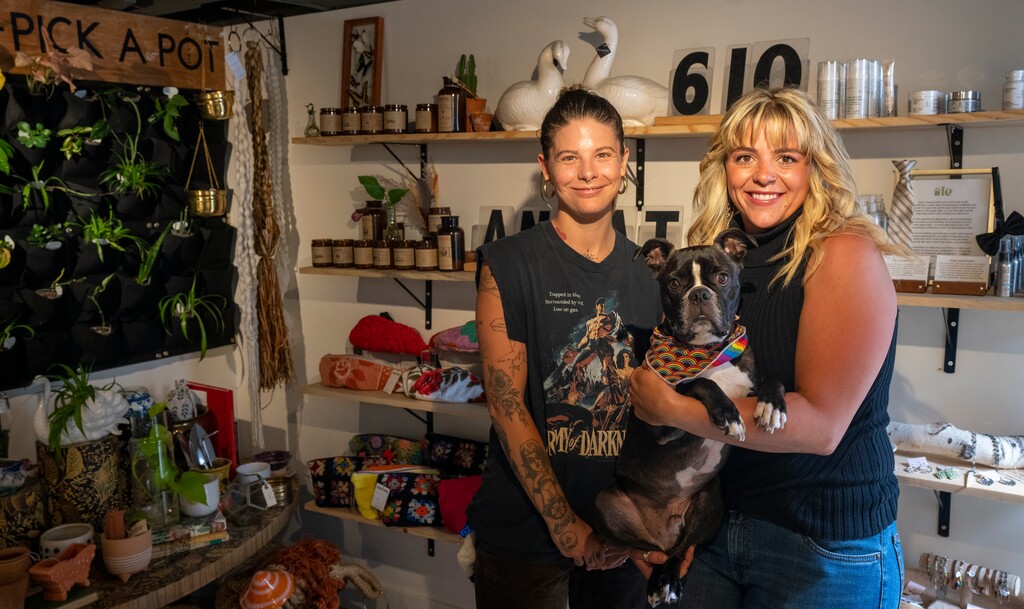 (Rick Egan | The Salt Lake Tribune) Rio Blanco and Nicole Jensen, co-owners of the Annata Collective, hold Meeko, at their store on 900 South, on Monday, Aug. 21, 2023.