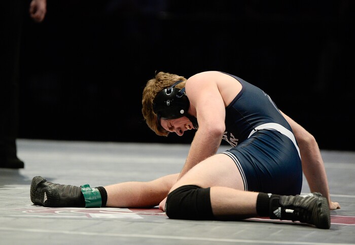 (Francisco Kjolseth  |  The Salt Lake Tribune)  Brad Findley of Corner Canyon agonizes in pain after having his leg badly twisted by Brayden Stevens of Brighton in the Class 5A 152 weight class state wrestling championship match at the Utah Valley University UCCU Center on Thursday, Feb. 8, 2018.