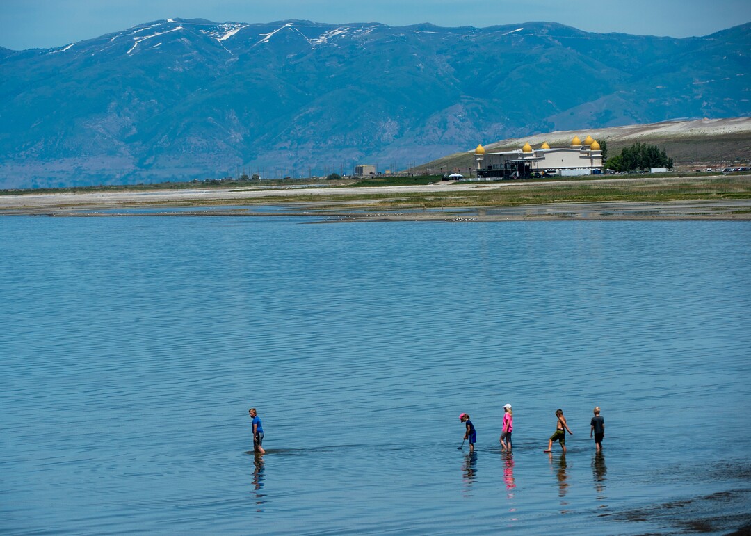 (Rick Egan  |  The Salt Lake Tribune)     A group of kids wade into the Great Salt Lake, Tuesday, June 11, 2019.