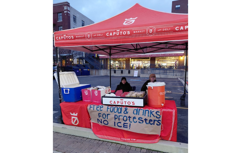 (Yelena Caputo) Caputo's Market & Deli set up a booth at in the store's parking lot on Thursday, Jan. 8, 2026, in support of anti-ICE protesters.