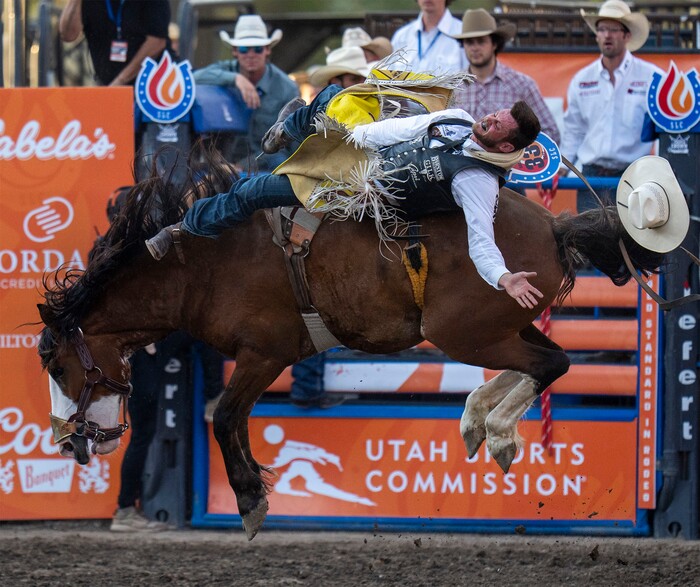 (Rick Egan | The Salt Lake Tribune) RC Landingham, from Hat Creek, Calif., competes in the bareback riding competition at the Utah Days of '47 Rodeo at the State Fairpark, on Monday, July 25, 2022.