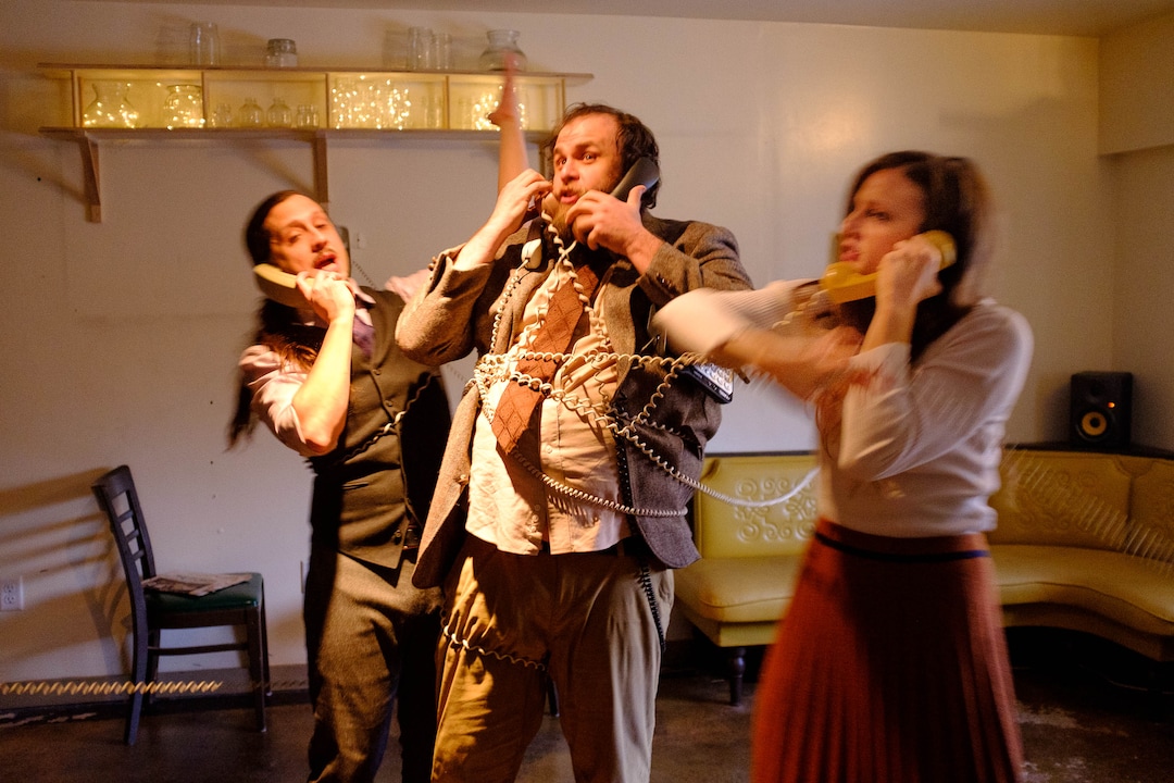 (Trent Nelson  |  The Salt Lake Tribune) Michael Watkiss, Rick Curtiss, and Rebecca Aneloski in "Thank You Theobromine," an interactive production that takes place inside a Salt Lake City chocolate factory on Sunday Nov. 17, 2019. For the 90-minute show — Produced by SONDERImmersive — the audience moves in and out of different rooms learning about the life and creative mind of a chocolatier through dance and theater. (The audience gets chocolate, too.)