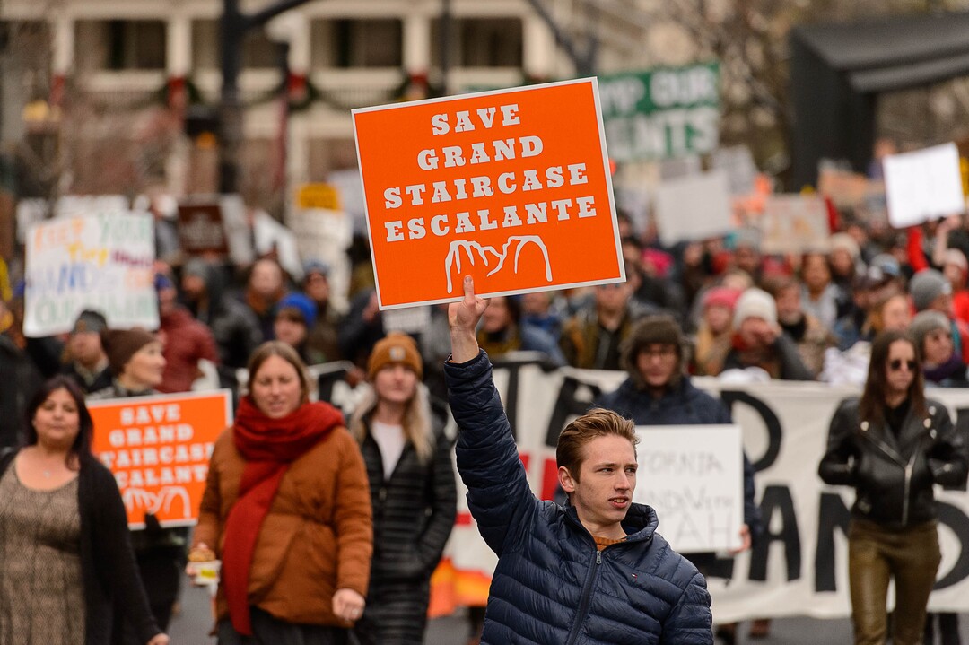 (Trent Nelson | The Salt Lake Tribune)  Protesters march down State Street after a rally against a visit by President Donald Trump, Monday December 4, 2017.
