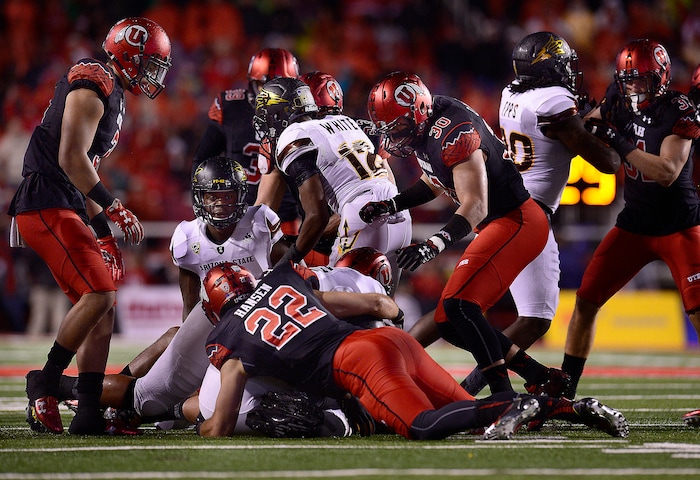 Scott Sommerdorf   |  The Salt Lake Tribune
Utah quarterback turned safety Chase Hansen (22), gets in on a sack of Arizona State Sun Devils QB Mike Bercovici (2) as Utah led Arizona State 14-10 at the half, Saturday, October 17, 2015. Utah won the game 34-18.