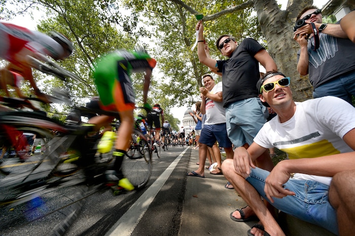 (Scott Sommerdorf   |  The Salt Lake Tribune)   Tour of Utah fans watch as riders head uphill on State Street toward the Utah State Capitol building. Robert Britton is the winner of the 2017 Tour of Utah, Sunday, August 6, 2017.