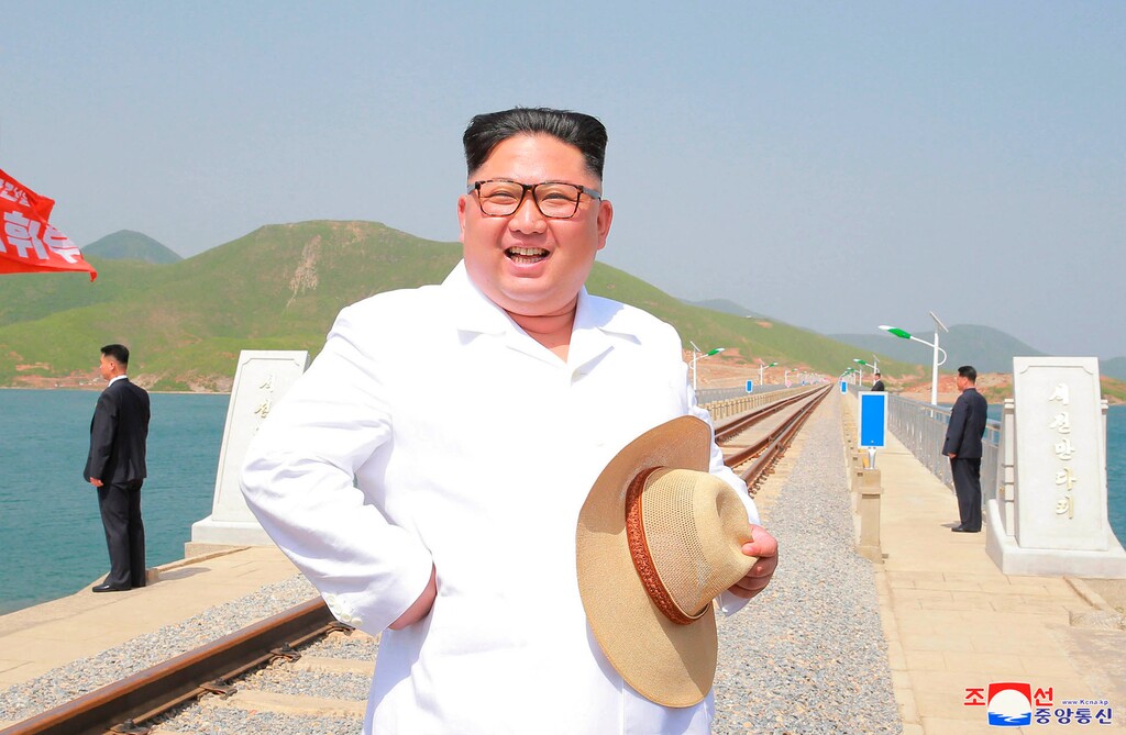 In this undated photo provided on Friday, May 25, 2018, by the North Korean government, North Korean leader Kim Jong Un inspects the completed Koam-Tapchon Railways in Gangwon-do, North Korea. Independent journalists were not given access to cover the event depicted in this image distributed by the North Korean government. The content of this image is as provided and cannot be independently verified. Korean language watermark on image as provided by source reads: "KCNA" which is the abbreviation for Korean Central News Agency. (Korean Central News Agency/Korea News Service via AP)