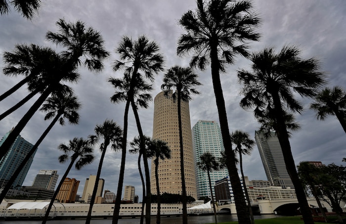 Storm clouds associated with the outer bands of Hurricane Irma shroud the downtown skyline Saturday, Sept. 9, 2017, in Tampa, Fla. Several parts of the Tampa Bay area are under a mandatory evacuation order for the approaching storm. (AP Photo/Chris O'Meara)