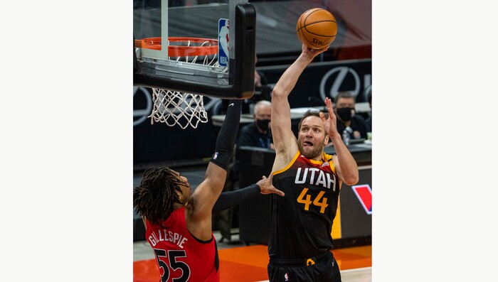 (Rick Egan | The Salt Lake Tribune) Utah Jazz forward Bojan Bogdanovic (44) attempts a dunk as Toronto Raptors forward Freddie Gillespie (55) defends, in NBA action between the Utah Jazz and the Toronto Raptors at Vivint Arena, on Saturday, May 1, 2021.