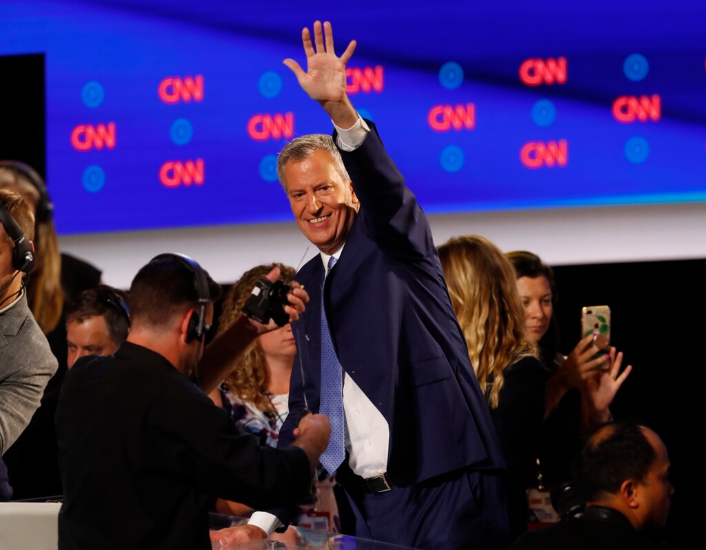 New York City Mayor Bill de Blasio waves after the second of two Democratic presidential primary debates hosted by CNN Wednesday, July 31, 2019, in the Fox Theatre in Detroit. (AP Photo/Paul Sancya)