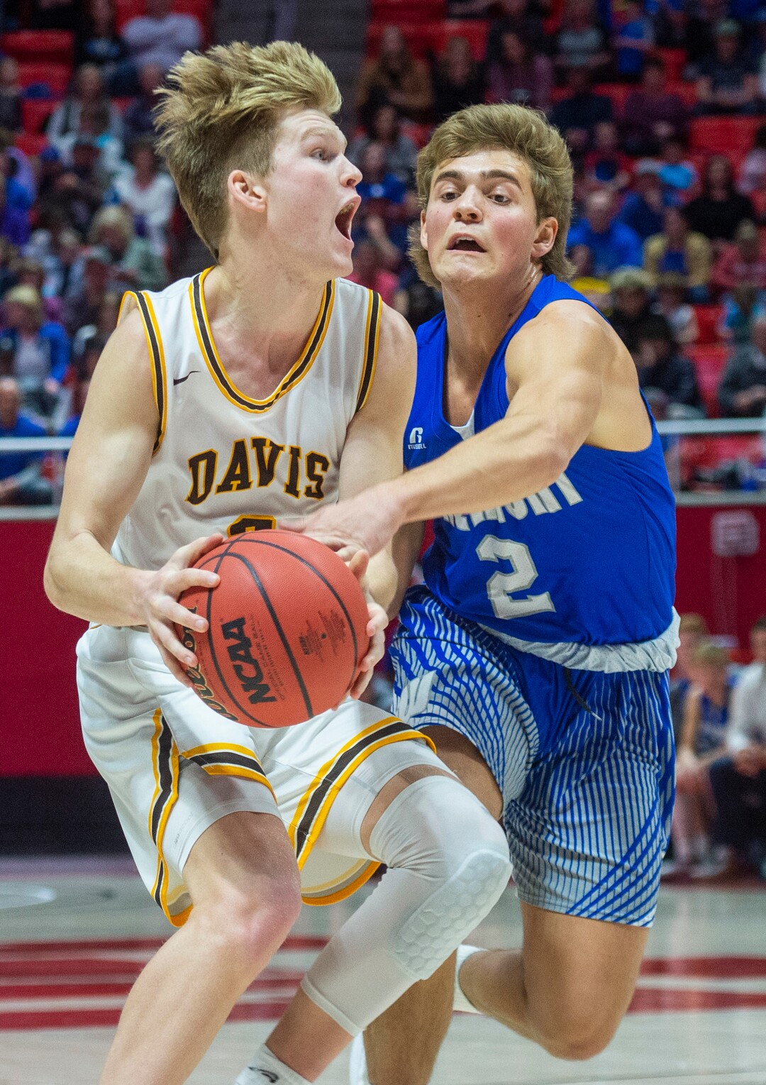 (Rick Egan  |  The Salt Lake Tribune)    Davis High guard Jake Sampson (3) brings the ball down court as Fremont Silverwolves Talmage Mitchell (2) defends, in the 6A championship game at the Jon M. Huntsman Center, Saturday Feb. 29, 2020