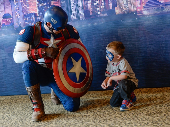 (Francisco Kjolseth  |  The Salt Lake Tribune)  Corbin Gleave, 6, tells Captain America all about it as Utah-based military families gather for the Salt Lake opening night of the all-new Marvel Universe LIVE! Age of Heroes, witnessing their favorite Marvel super heroes, including The Avengers, Spider-Man and the Guardians of the Galaxy in an action-packed adventure at the Maverik Center on Thursday, Sept. 28, 2017. MarvelÕs greatest military Super Hero Captain America was partnered with Got Your 6, a military veteran non-profit group dedicated to empowering veterans to lead and build stronger communities across America.