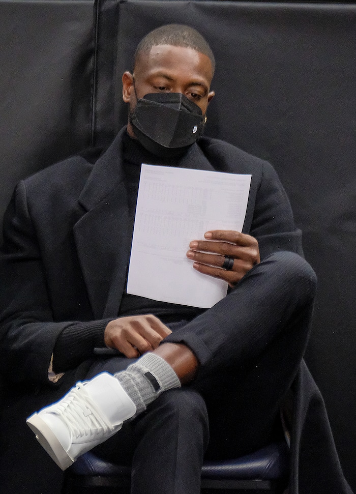 (Leah Hogsten | The Salt Lake Tribune) Utah Jazz minority owner Dwyane Wade checks the first quarter stats as the Utah Jazz host the Indiana Pacers, Friday, April 16, 2021, at Vivint Arena.