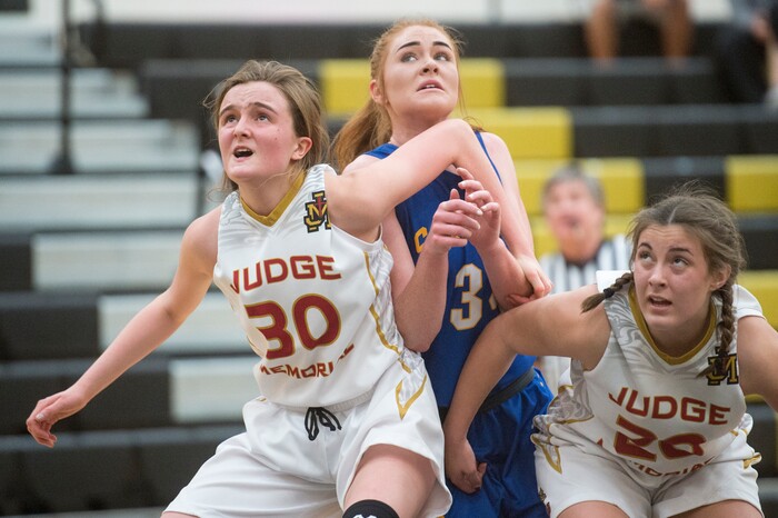 (Rick Egan  |  The Salt Lake Tribune)   Abigayle Kendell (30) and Abbey Storms (20)Judge Memorial box out Delaney Palmer, (34), in 3A Women's basketball State playoff action Judge Memorial vs. San Juan, in Heber City, Friday, Feb. 16, 2018.
