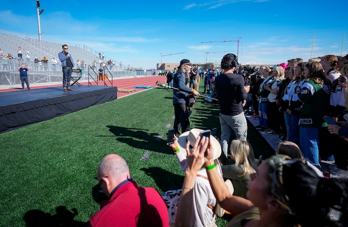 (Bethany Baker | The Salt Lake Tribune) Kevin Bacon speaks at a charity event to commemorate the 40th anniversary of the movie ÒFootlooseÓ on the football field of Payson High School in Payson on Saturday, April 20, 2024.