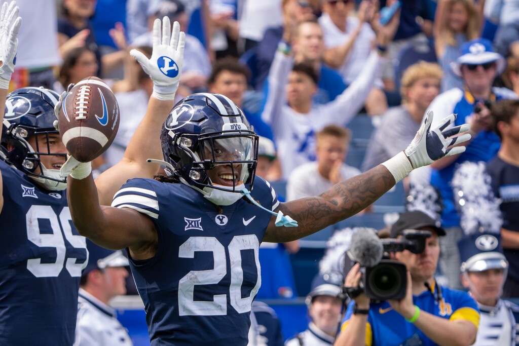 (Rick Egan | The Salt Lake Tribune) Brigham Young Cougars running back Deion Smith (20), celebrates his touchdown, in football a between the Southern Utah Thunderbirds and the Brigham Young Cougars, at Lavell Edwards Stadium, on Saturday, Sept. 9, 2023.