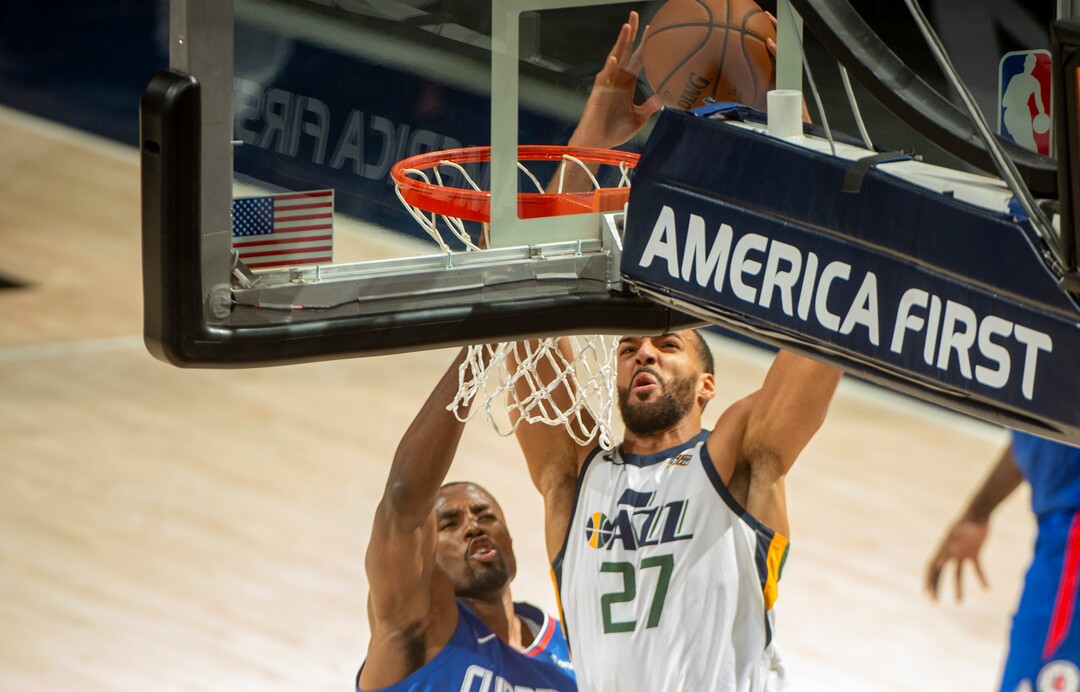 (Rick Egan | The Salt Lake Tribune) Utah Jazz center Rudy Gobert (27) dunks over LA Clippers forward Serge Ibaka (9), in NBA action between the Utah Jazz and the LA Clippers at Vivint Arena, on Friday, Jan. 1, 2021.