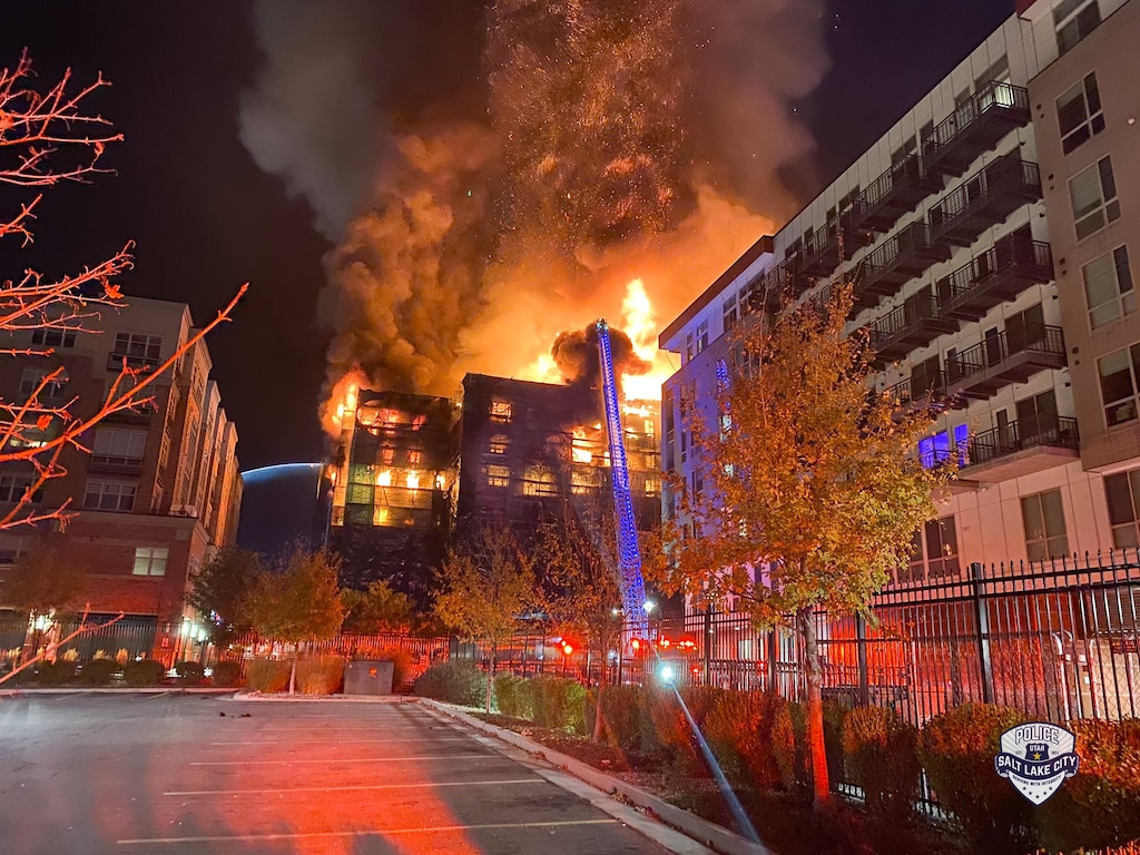 (Salt Lake City Police Department) Salt Lake City fire crews respond to a massive blaze at an apparently unoccupied, under-construction building in Sugar House early Wednesday, Oct. 25, 2022. Salt Lake City police assisted fire officials in securing the scene.