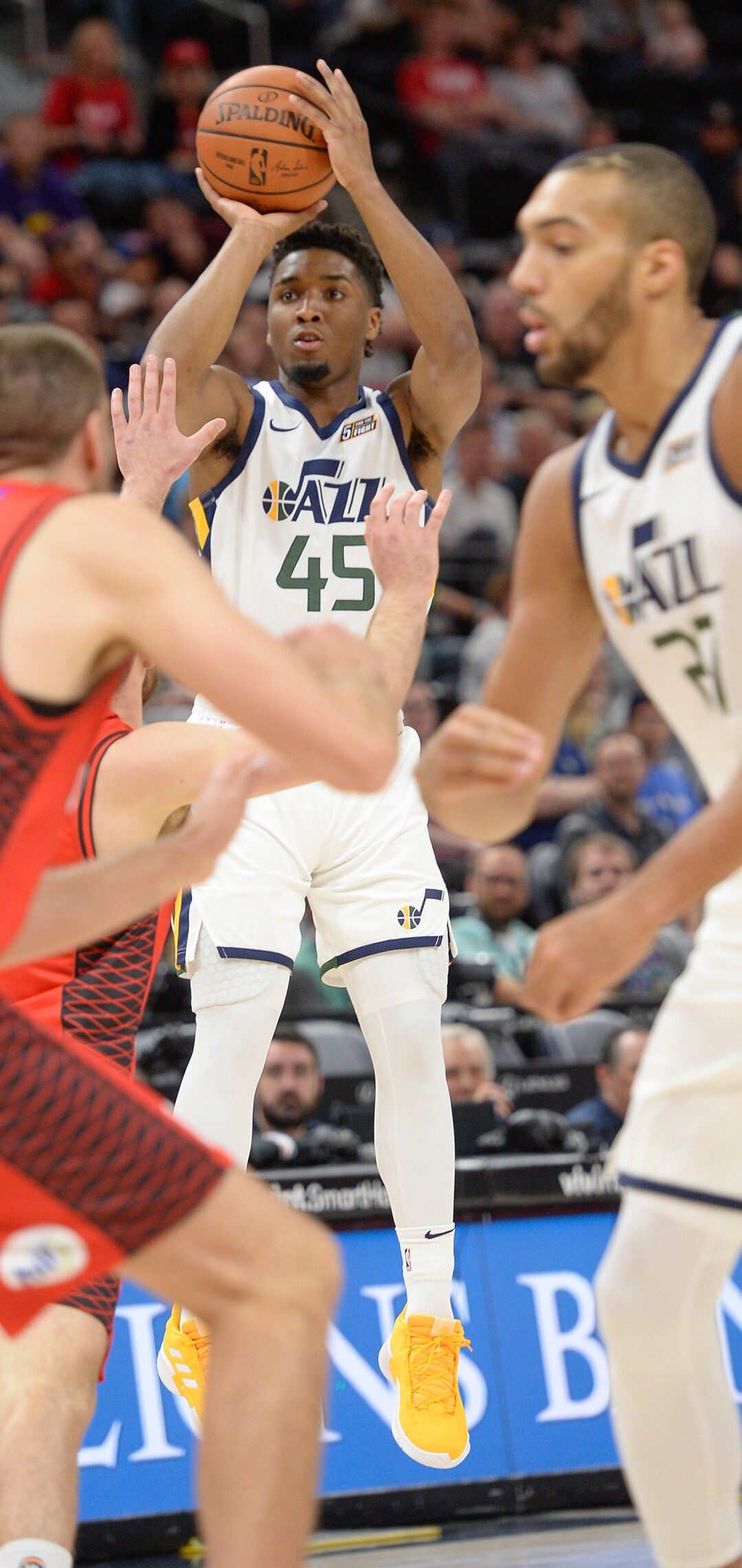 Leah Hogsten  |  The Salt Lake Tribune   Utah Jazz guard Donovan Mitchell hits the net as the Utah Jazz host the Perth Wildcats, Sept. 29, 2018 at Vivint Smart Home Arena.