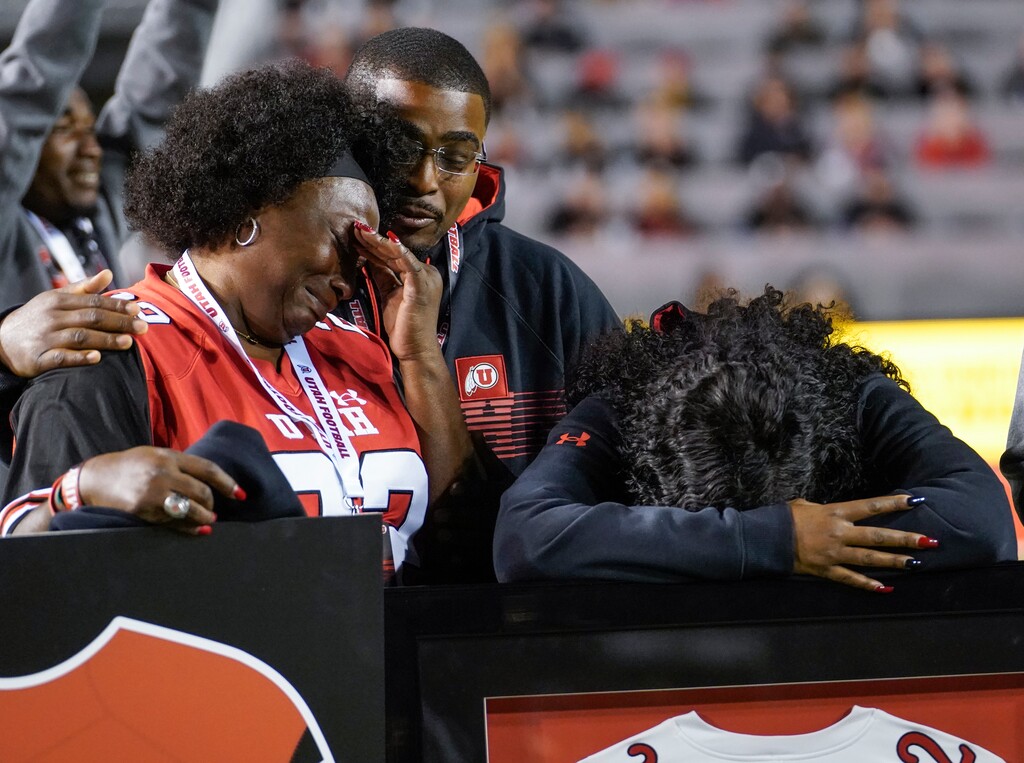 (Leah Hogsten | The Salt Lake Tribune) The family of Aaron Lowe, including his mother Donna Lowe-Stern, Lowe's older brother, Christopher Jackson and Lowe's sister Davetta Jones weep as Lowe is remembered Saturday. For the first time in school history, the University of Utah has officially retired the No. 22 in its football program. The designation happened during the Utes game against UCLA at Rice-Eccles Stadium on Oct. 30, 2021. Retiring No. 22 honors two players who have lost their lives in the past year, running back Ty Jordan, who died Dec. 25 and defensive back Aaron Lowe, who died Sept. 26, 2021. Lowe-Stern has not returned to Utah since that game.