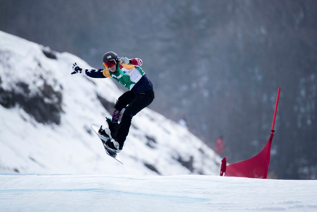 Brenna Huckaby of the U.S. competes during the Women's Snowboard Cross Final SB-LL1 at the Jeongseon Alpine Centre at the Pyeongchang 2018 Paralympic Winter Games in Pyeongchang, South Korea, Monday, March 12, 2018. (Simon Bruty/OIS/IOC via AP)