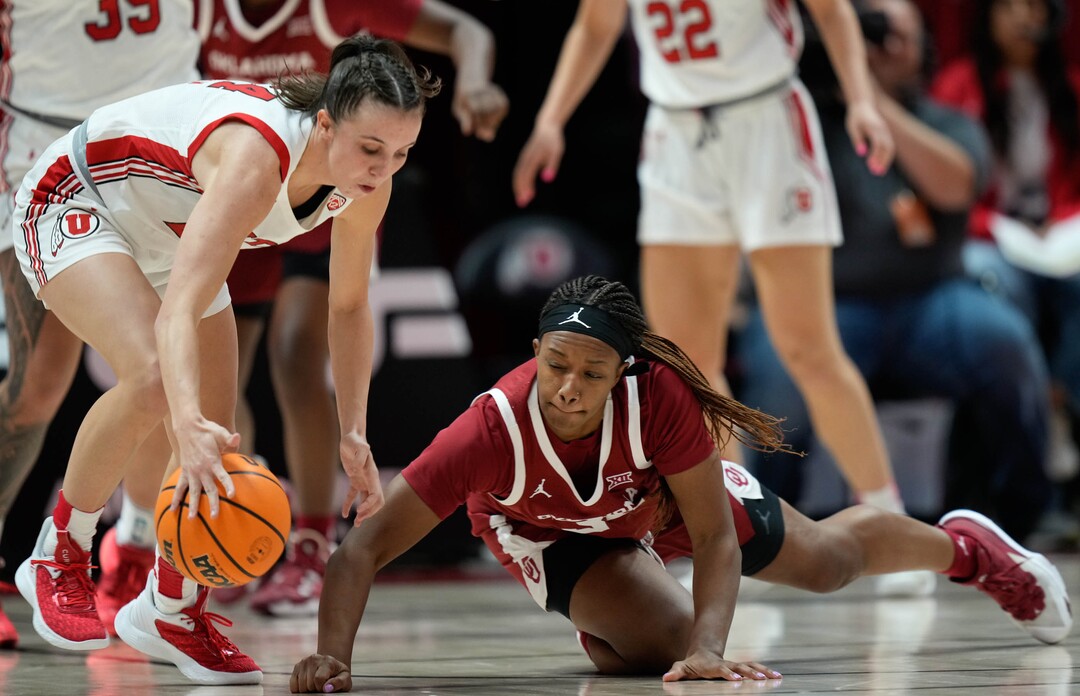 (Francisco Kjolseth | The Salt Lake Tribune) Oklahoma Sooners forward Liz Scott (34) loses control of the ball against Utah Utes guard Kennady McQueen (24) as the University of Utah hosts the Oklahoma Sooners in women’s NCAA basketball in Salt Lake City on Wednesday, Nov. 16, 2022.