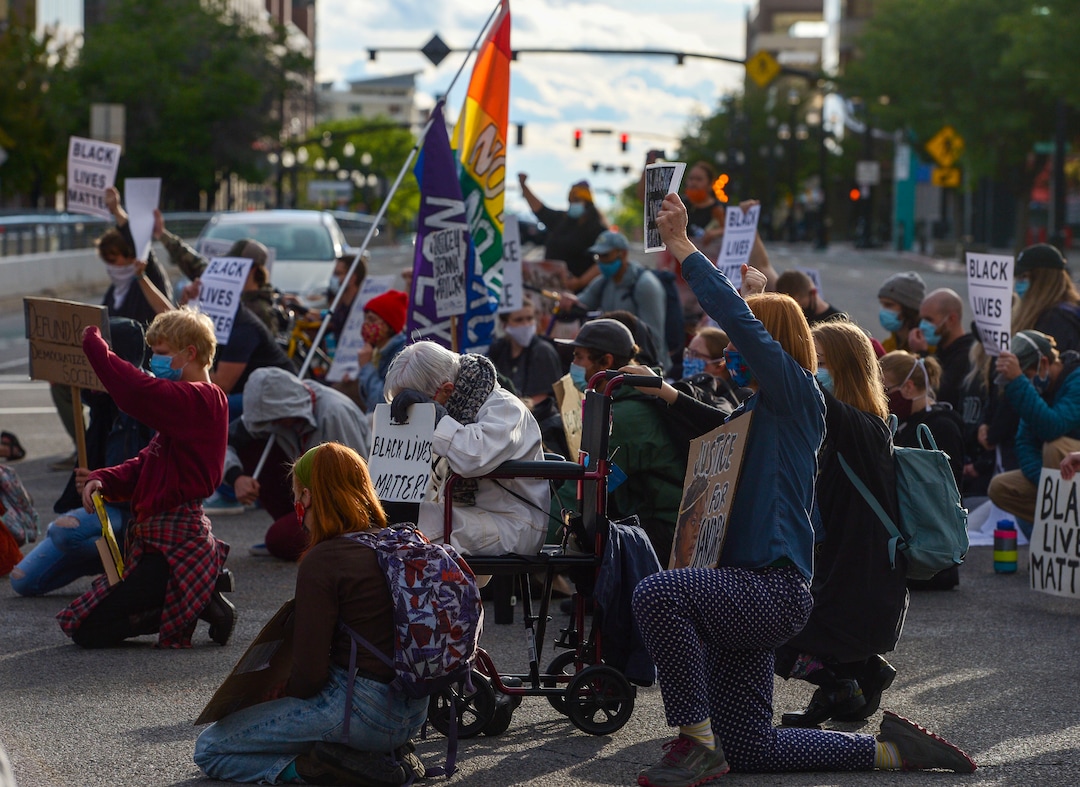 (Leah Hogsten  |  The Salt Lake Tribune) Demonstrators with Black Lives Matter marched from the Utah Capitol down State Street, stopping at every intersection for five minutes in honor of George Floyd, June 8, 2020.