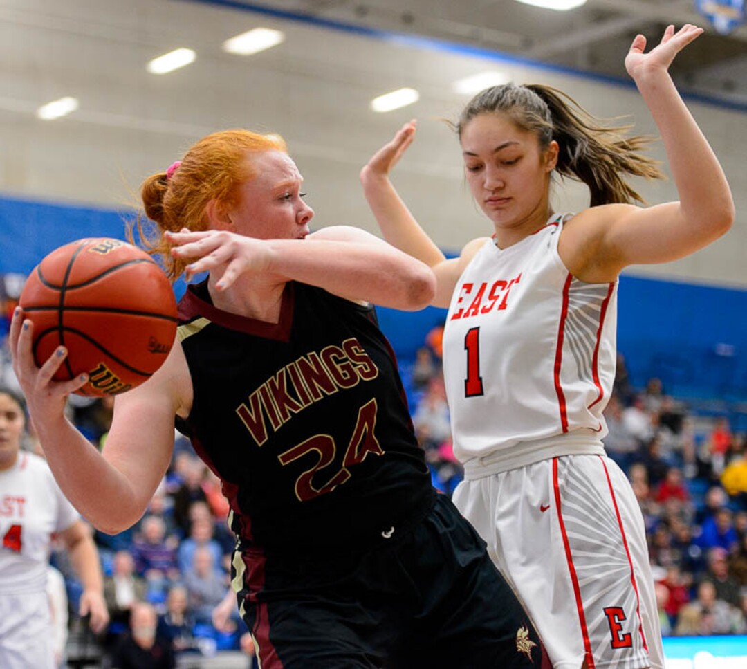 (Trent Nelson | The Salt Lake Tribune)  Viewmont's Hannah Simonson (24) and East's Deserae Falatea (1) as East faces Viewmont in the 5A High School Girls' Basketball Tournament at SLCC in Taylorsville, Wednesday Feb. 21, 2018.