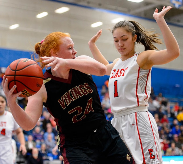 (Trent Nelson | The Salt Lake Tribune)  Viewmont's Hannah Simonson (24) and East's Deserae Falatea (1) as East faces Viewmont in the 5A High School Girls' Basketball Tournament at SLCC in Taylorsville, Wednesday Feb. 21, 2018.