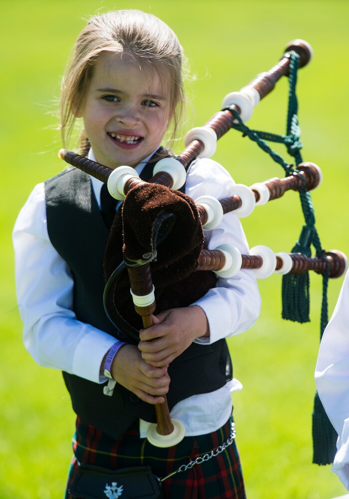 (Rick Egan  |  The Salt Lake Tribune)      Rylee McOmie of West Jordan, plays the bagpipes with the Utah Pipe Band, at the 44th annual Utah Scottish Festival and Highland Games at the Utah State Fairgrounds, Sunday, June 10, 2018.