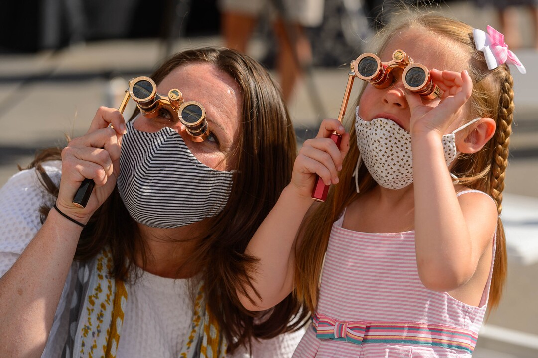 (Trent Nelson  |  The Salt Lake Tribune) Holly and Harper Yocom look up at the new "Utah Women 2020" mural, featuring more than 200 Utah women from the past and present, on the Dinwoody Building in Salt Lake City on Wednesday, Aug. 26, 2020. Holly and Harper also appear on the mural.