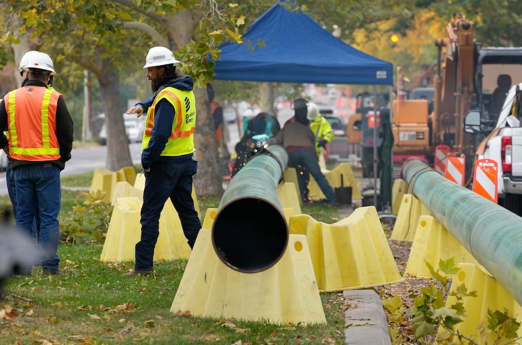 (Francisco Kjolseth | The Salt Lake Tribune) Dominion Energy replaces aging infrastructure as it works on a gas line replacement project along 200 South and Lincoln Street in Salt Lake City on Tuesday, Oct. 25, 2022. Canada's Enbridge Gas finalized its purchase of Dominion's Utah utility on June 1, 2024.