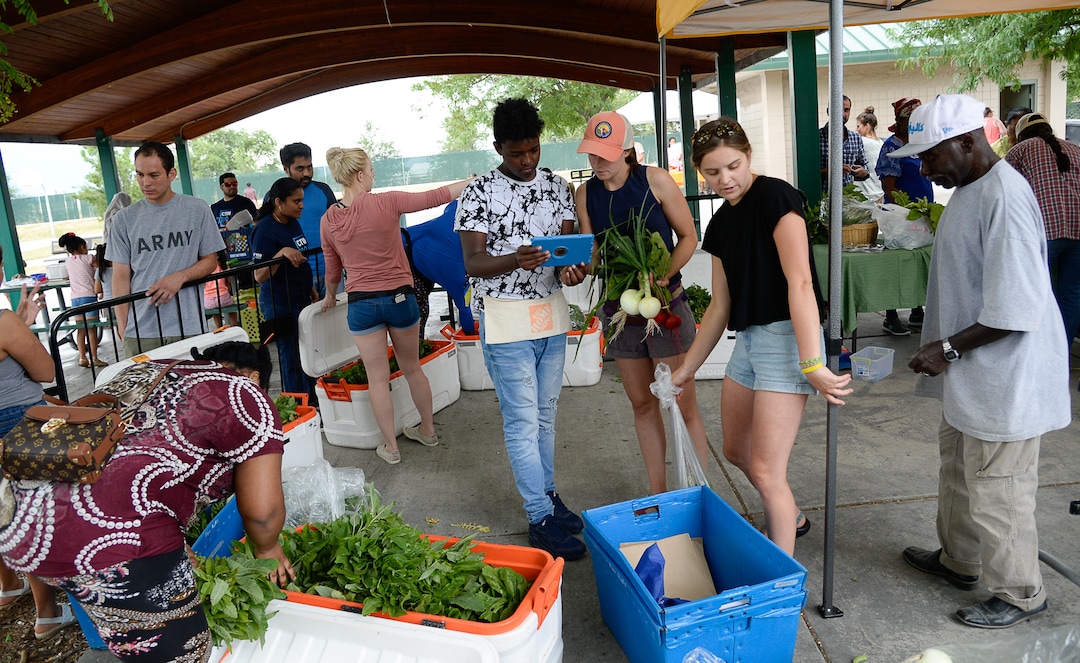 (Francisco Kjolseth  |  The Salt Lake Tribune)   The Sunnyvale Farmers Market at 4013 S. 700 West, draws a weekly refugee clientele on Saturday, July 13, 2019, selling food grown exclusively by refugees living in Utah, specializing in ethnic crops familiar to many of the residents in the Sunnyvale neighborhood.