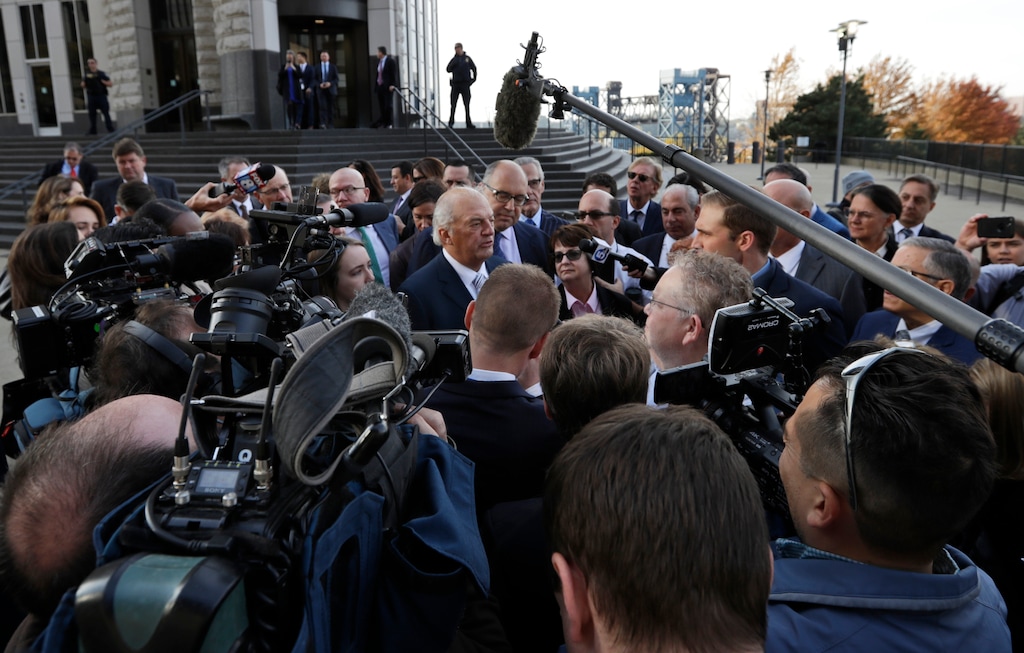 (Tony Dejak | AP) Attorney Joe Rice, center, speaks to the media outside the U.S. Federal courthouse, Monday, Oct. 21, 2019, in Cleveland. The nation's three dominant drug distributors and a big drugmaker have reached a $260 million deal to settle a lawsuit related to the opioid crisis just as the first federal trial over the crisis was due to begin Monday.