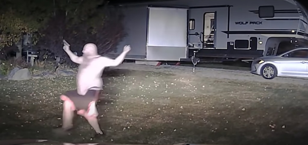 (Photo courtesy of the Weber County Attorney's Office | In this screen grab from police video footage, Cody Hadley is running parallel to officers with a gun just before he is fatally shot by Weber County Deputies on Oct. 23, 2020. Hadley was suspected of breaking into a trailer and firing a gun inside.)