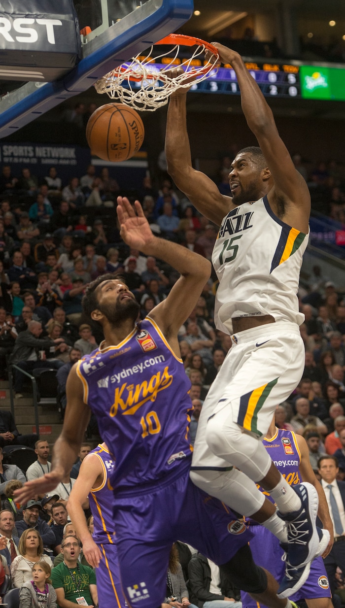 (Rick Egan  |  The Salt Lake Tribune) Utah Jazz forward Derrick Favors (15) dunks the ball over Sydney Kings center, Amritpal Singh, (10), in preseason basketball Utah Jazz vs.Sydney Kings, in Salt Lake City, Sunday, October 2, 2017.


