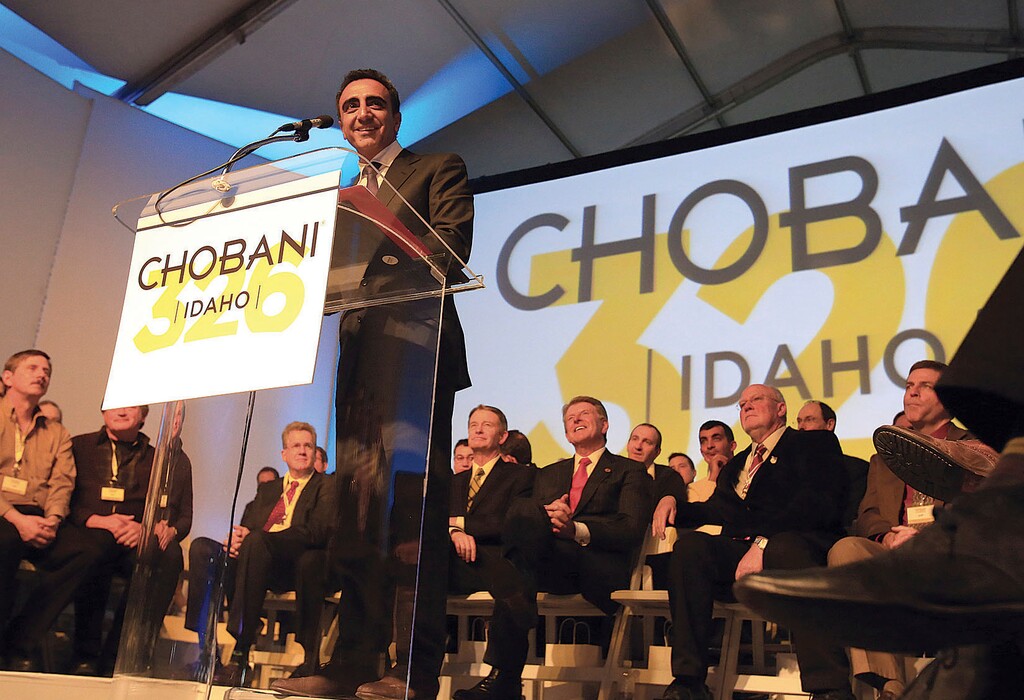 FILE - In this Dec. 17, 2012 file photo, Chobani CEO Hamdi Ulukaya speaks during the grand opening of the company's new plant in Twin Falls, Idaho. Greek yogurt giant Chobani announced Thursday, Nov. 9, 2017 a $20 million expansion of its world's largest yogurt plant in south-central Idaho to serve as the company's global research and development center. Chobani CEO Hamdi Ulukaya says he's thrilled to begin building a 70,000-square-foot innovation facility in a region he's dubbed the "Silicon Valley of food."(Ashley Smith/Times-News via AP, File)