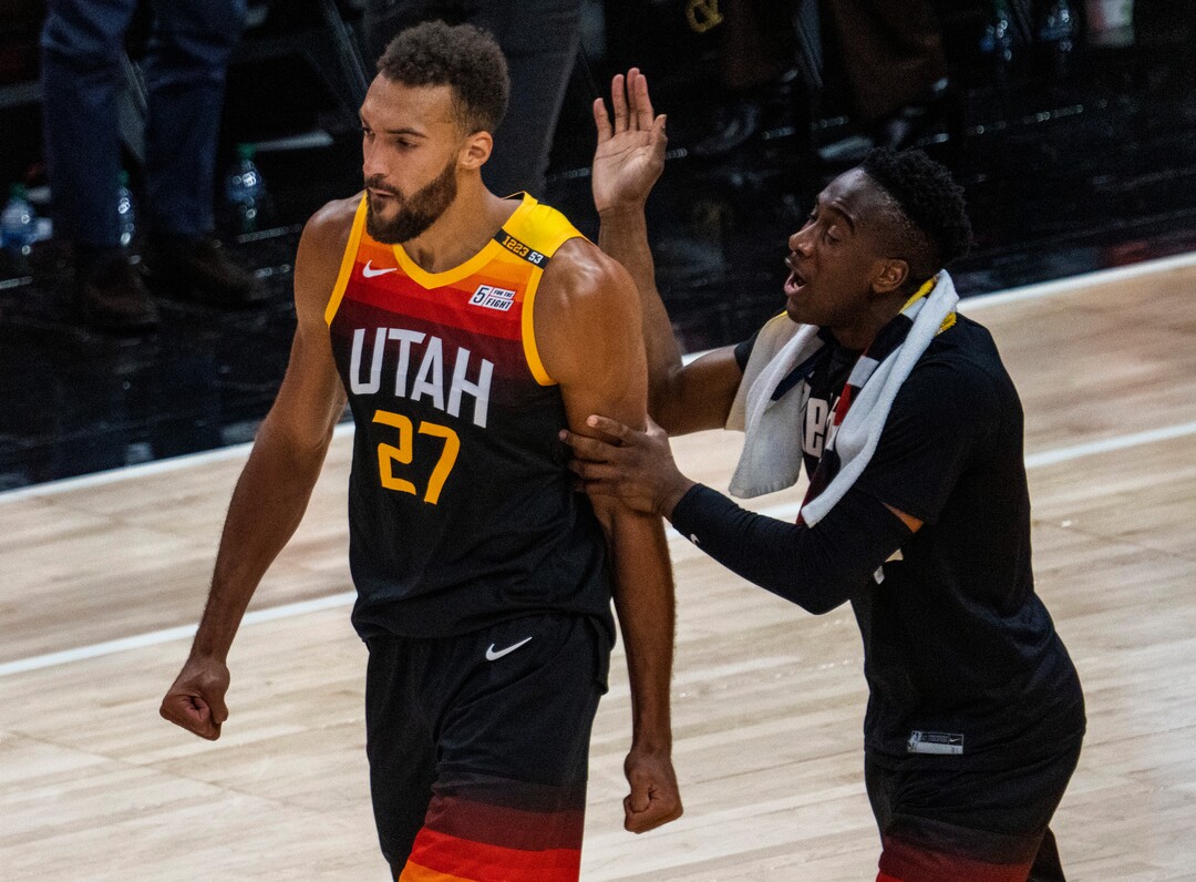 (Rick Egan | The Salt Lake Tribune) Utah Jazz guard Miye Oni, right, congratulates Utah Jazz center Rudy Gobert (27) after he blocked a shot by LA Clippers forward Marcus Morris Sr. (8) with seconds left in Game One of the second round of the NBA playoffs at Vivint Arena, on Tuesday, June 8, 2021.