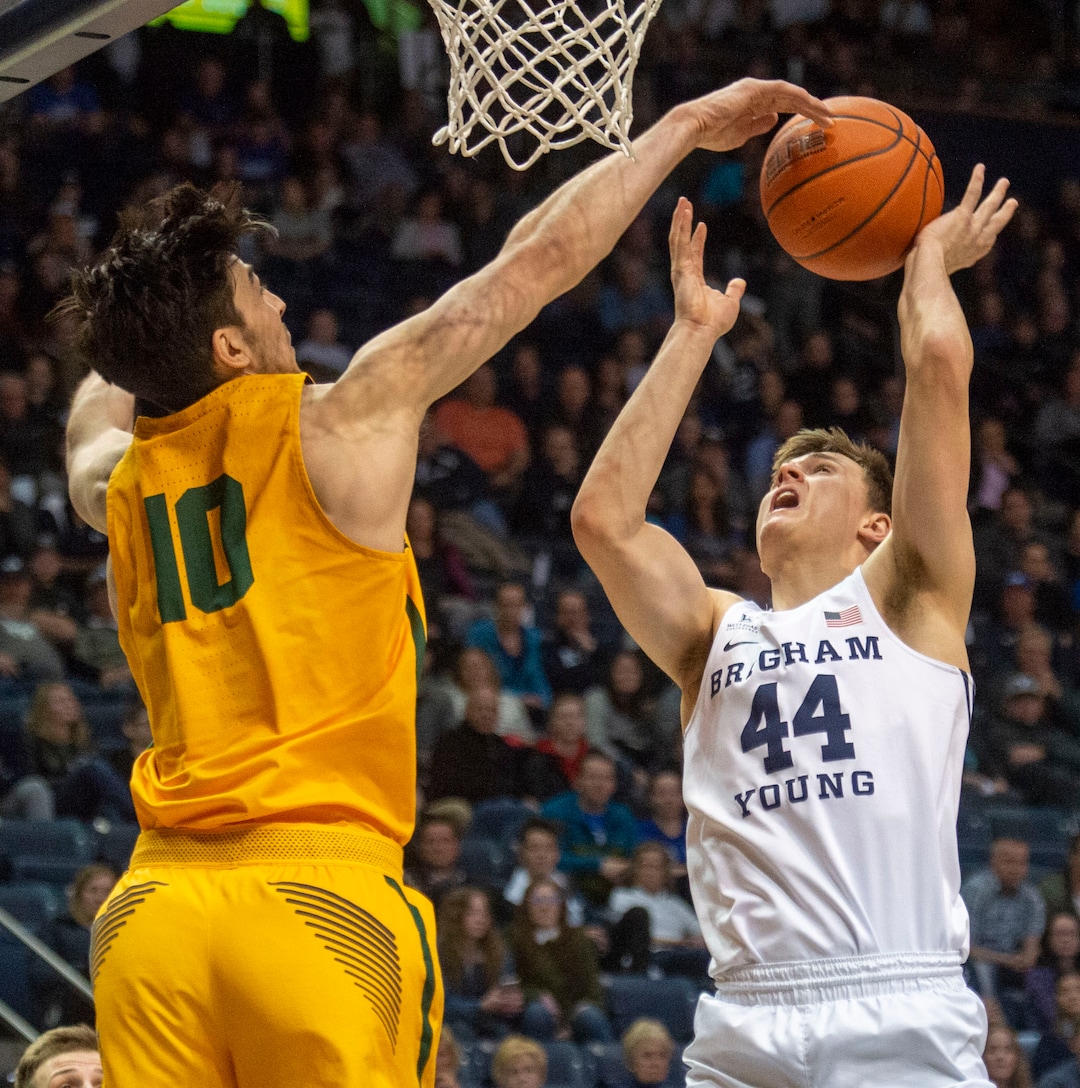 (Rick Egan  |  The Salt Lake Tribune)      San Francisco Dons forward Matt McCarthy (10)  blocks a shot by Brigham Young Cougars guard Connor Harding (44), in WCC basketball action between Brigham Young Cougars and San Francisco Dons, at the Marriott  Center, Thursday, February 21, 2018.