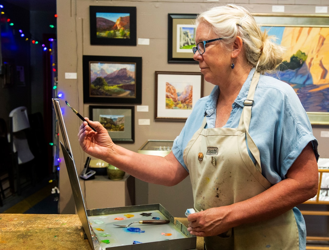 (Rick Egan  |  The Salt Lake Tribune)        Diane Walsh paints in the Artisans Art Gallery in Cedar City, Wednesday, June 19, 2019.