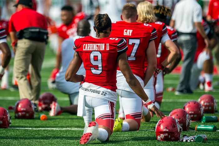 (Chris Detrick | The Salt Lake Tribune) Utah Utes wide receiver Darren Carrington (9) stretches before the game at Rice-Eccles Stadium Thursday, August 31, 2017. Utah Utes defeated North Dakota Fighting Hawks 37-16.