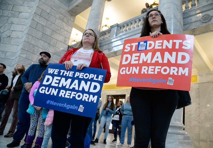 (Francisco Kjolseth  |  The Salt Lake Tribune) Caroline Phinney, left, and Chiemi Maloy join a rally at the Utah Capitol for a mid-session report card on the progress of gun violence and public safety bills in the Utah Legislature on Saturday, Feb. 15, 2020. The rally took place the day after the anniversary of the shooting at Stoneman Douglas high school in Parkland, FL.