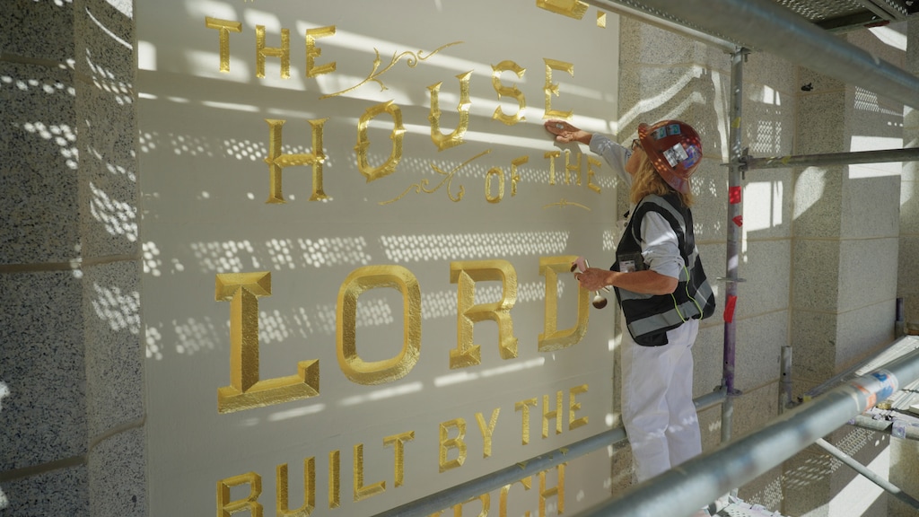 (The Church of Jesus Christ of Latter-day Saints) Artist Anne Domenech makes restorative work to a panel in the Salt Lake Temple, Aug. 18, 2025.