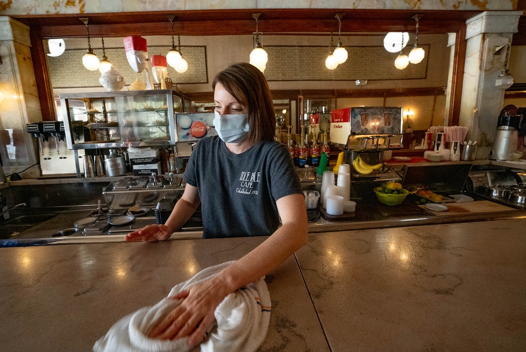 (Francisco Kjolseth | The Salt Lake Tribune) Jana Porter, co-owner of Idle Isle Cafe in Brigham City wipes down the historic marble counter top of the popular restaurant that is turning 100 this month. The restaurant has been in its current location since May 1, 1921 — making it one of Utah's continuously operating restaurant.