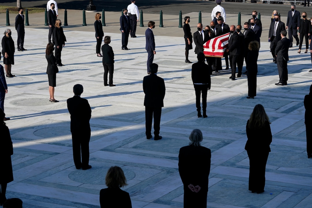 The flag-draped casket of Justice Ruth Bader Ginsburg arrives at the Supreme Court in Washington, Wednesday, Sept. 23, 2020. Ginsburg, 87, died of cancer on Sept. 18. (AP Photo/Alex Brandon, Pool)