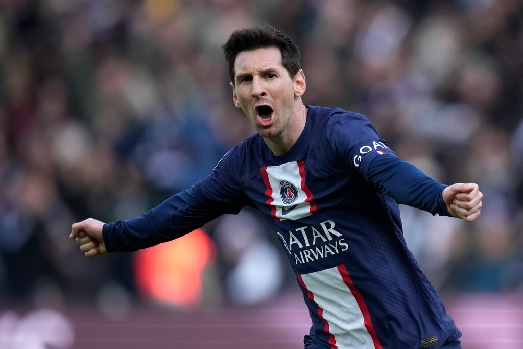 (Christophe Ena | AP)  PSG's Lionel Messi celebrates after scoring his side's fourth goal during the French League One soccer match between Paris Saint-Germain and Lille at the Parc des Princes stadium, in Paris, France, Sunday, Feb. 19, 2023. Lionel Messi says he is coming to Inter Miami and joining Major League Soccer. After months of speculation, Messi announced his decision Wednesday, June 7, 2023,to join a Miami franchise that has been led by another global soccer icon in David Beckham since its inception but has yet to make any real splashes on the field.