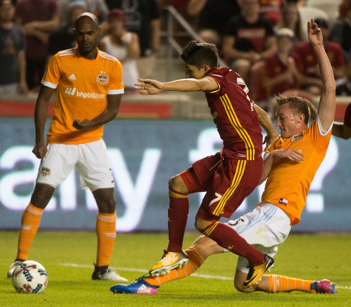 (Rick Egan | The Salt Lake Tribune) Real Salt Lake forward Jefferson Savarino (7) collides with Houston Dynamo defender Dylan Remick (15), in MLS action, Real Salt Lake vs. Houston Dynamo, in Sandy, Saturday, August 5, 2017.