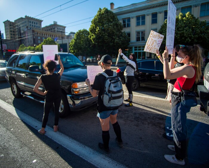 (Rick Egan  |  The Salt Lake Tribune) Protesters block traffic on 400 South in Salt Lake City during a demonstration for Bernardo Palacios-Carbajal on Monday, June 22, 2020.